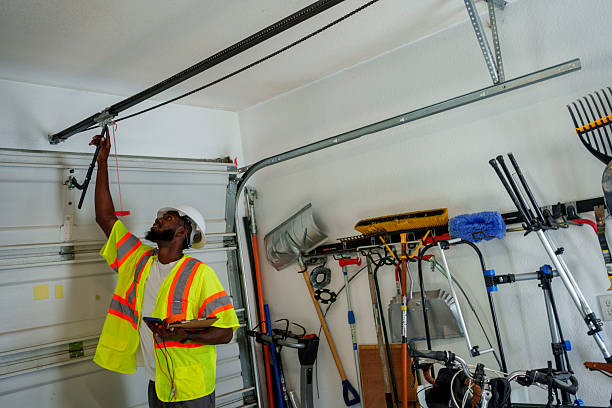 Professional Garage Door Panel Replacement technician working in St. Anthony, ID